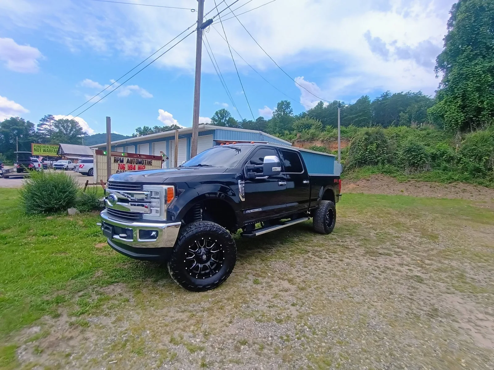 Black lifted pickup truck detailed by BoPeeps